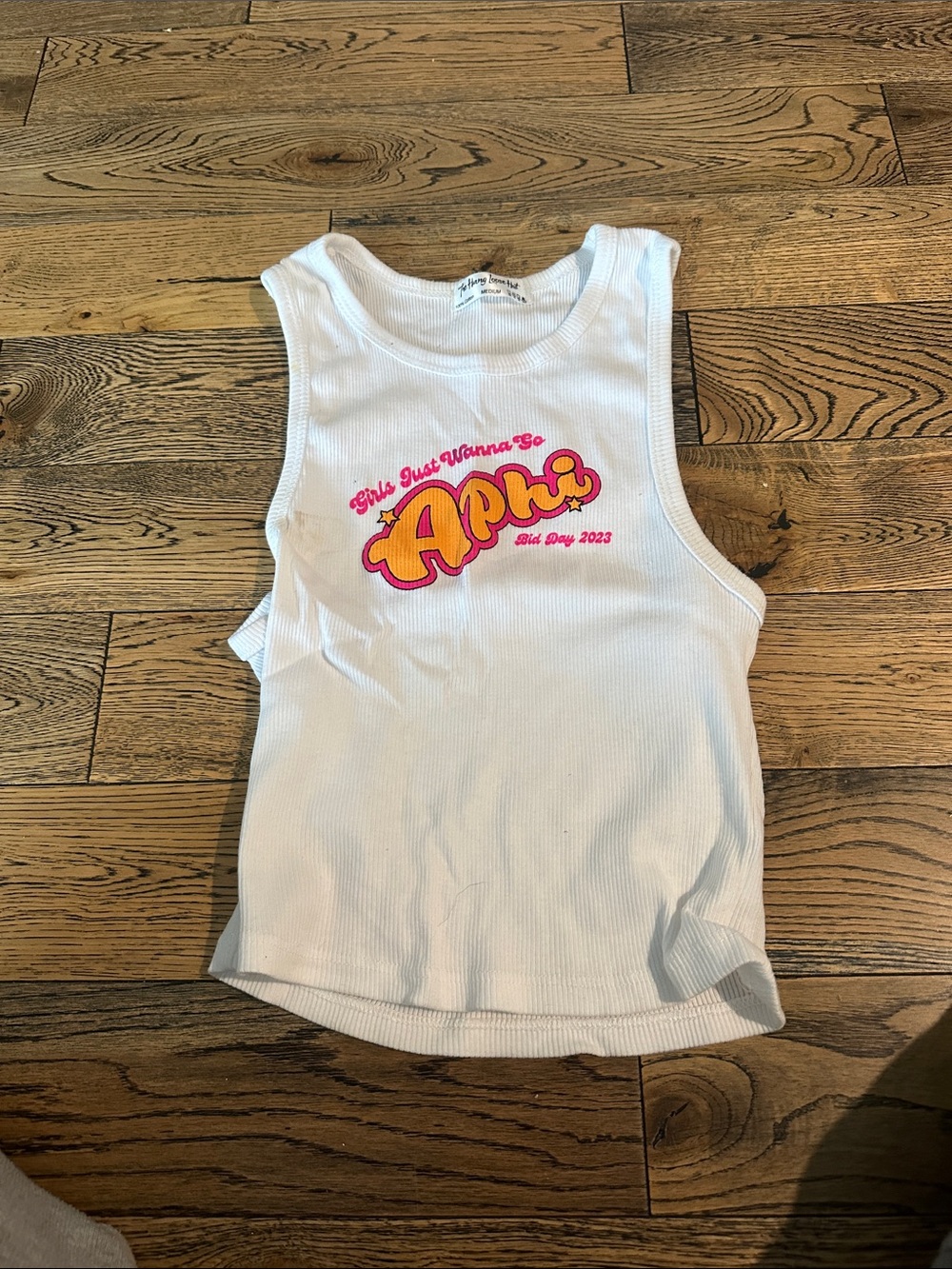 White Ribbed Tank with Pink & Yellow 'APHI' Graphic